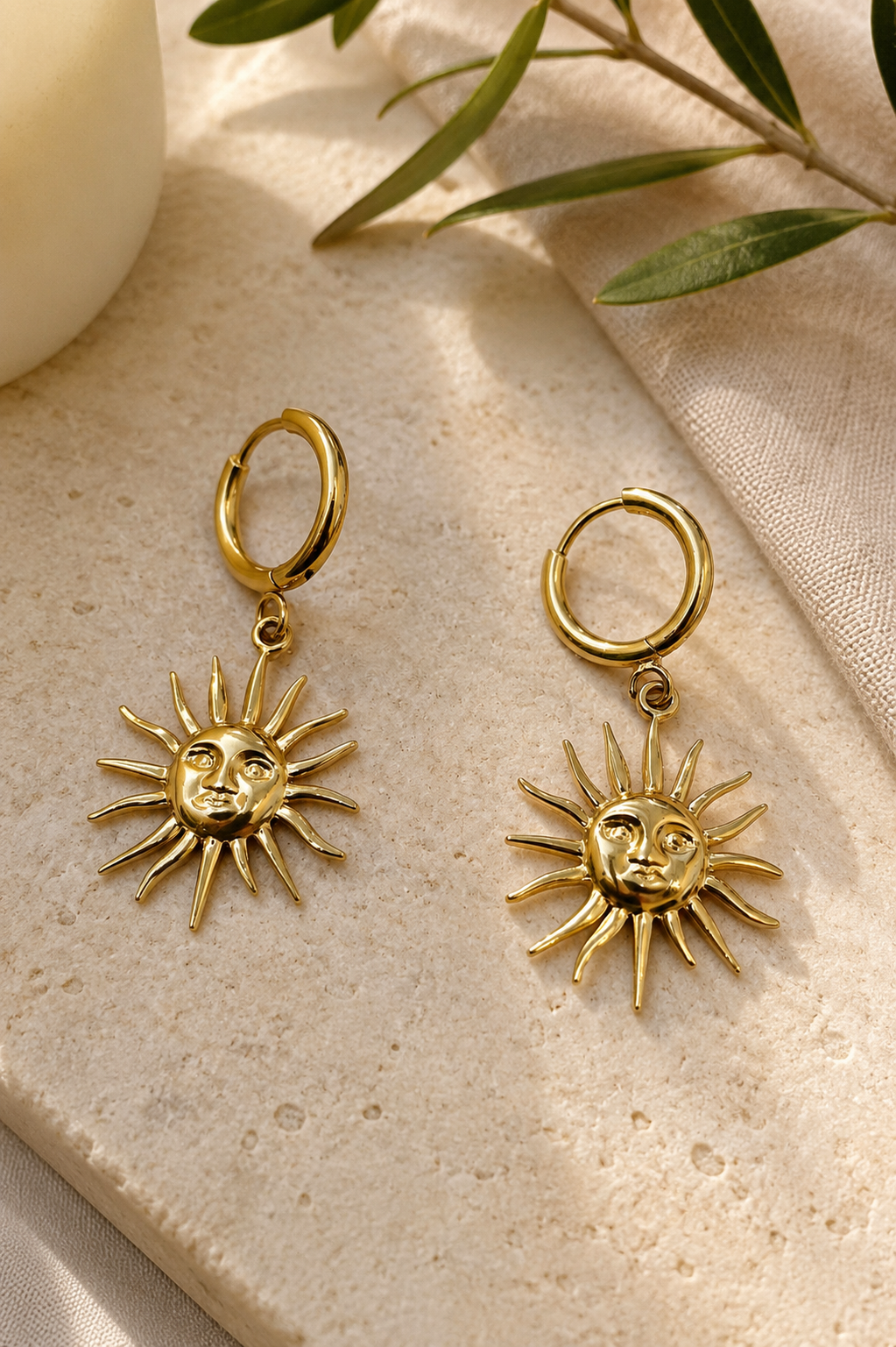 Pendientes sol dorados