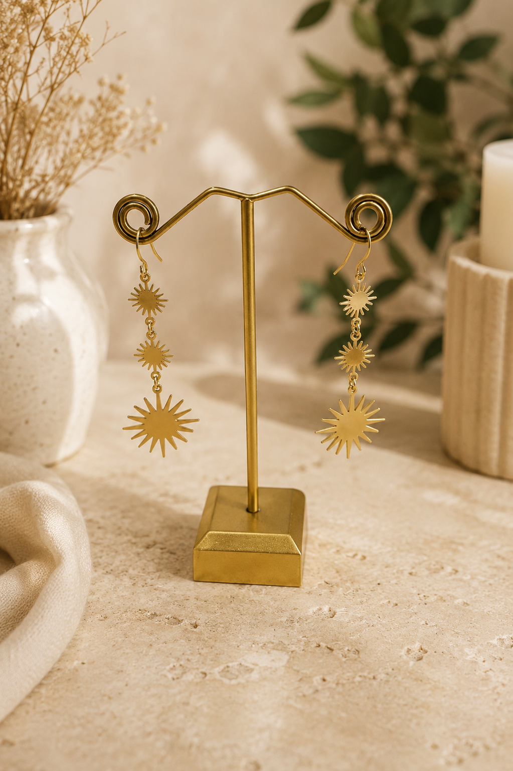 Pendientes colgantes dorados con soles
