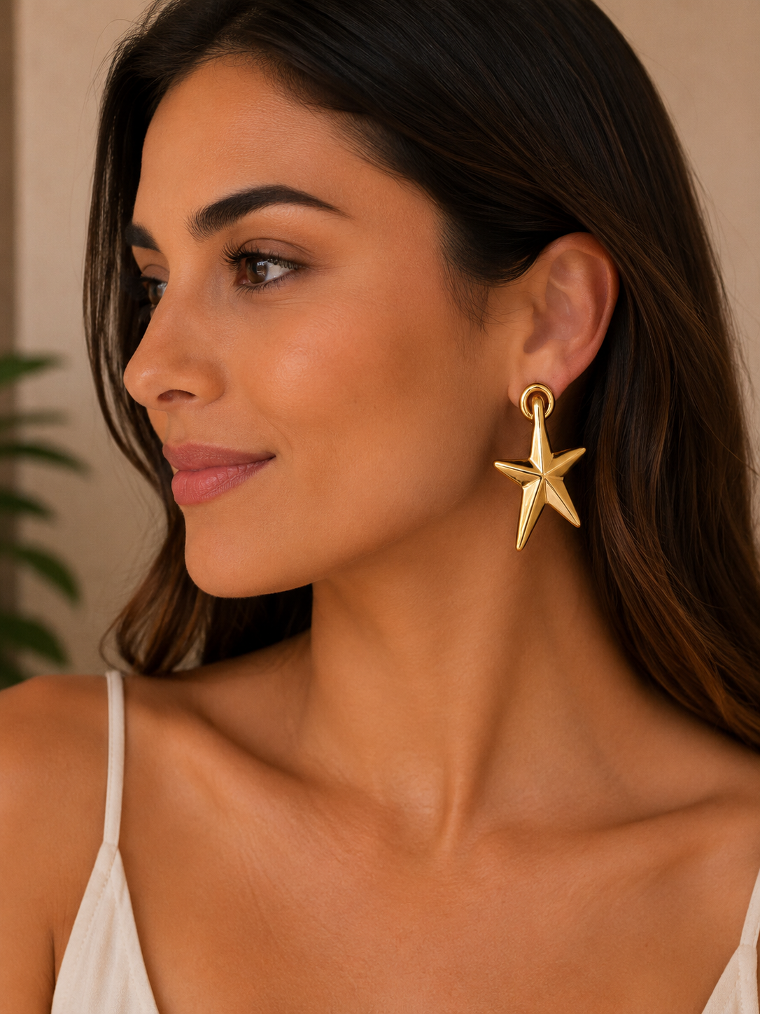 Pendientes estrella dorada