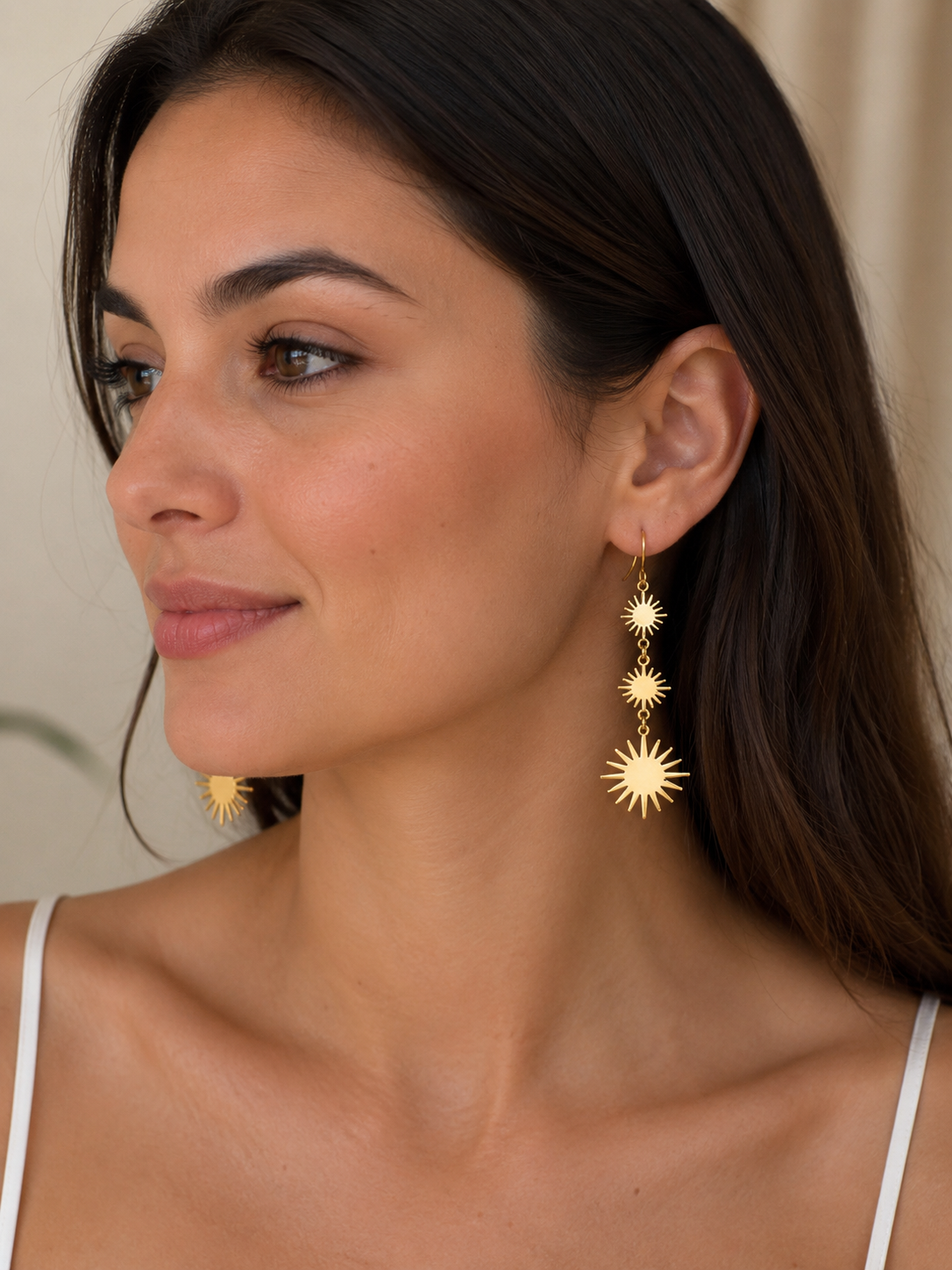 Pendientes colgantes dorados con soles