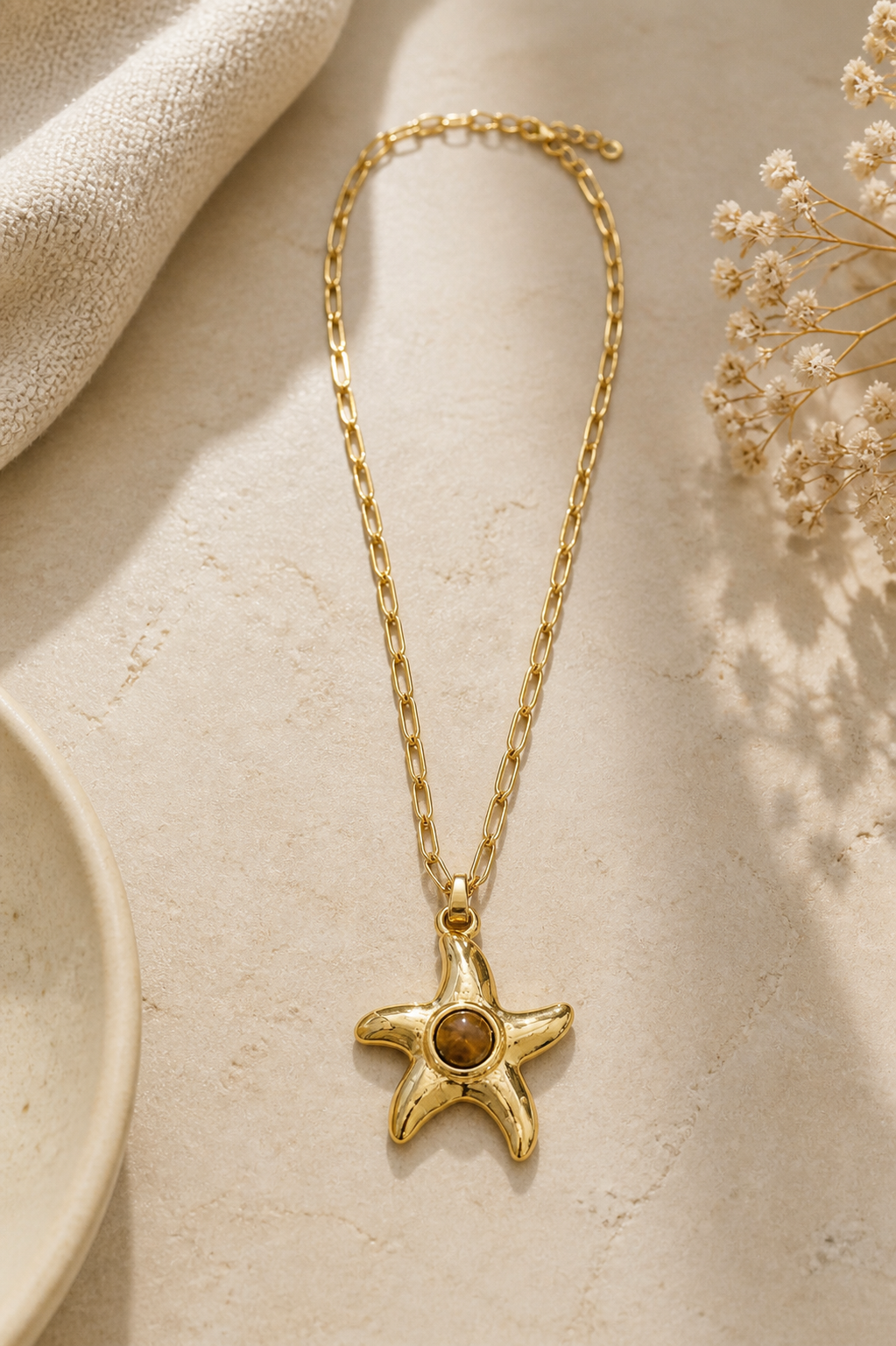 Collar acero estrella dorado con piedra