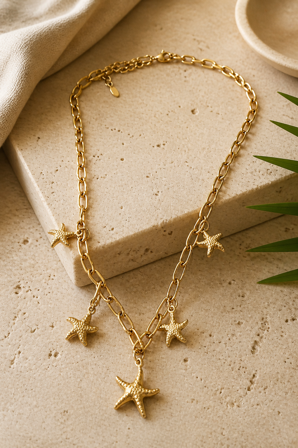 Collar acero dorado con estrellas de mar