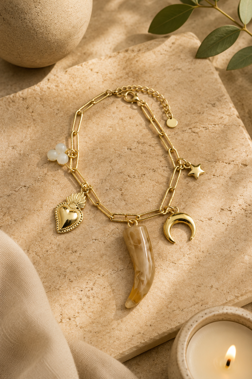 Pulsera dorada con colgante efecto mármol