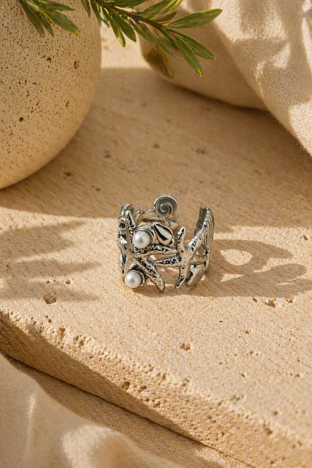 Anillo plateado estrella de mar con perlas