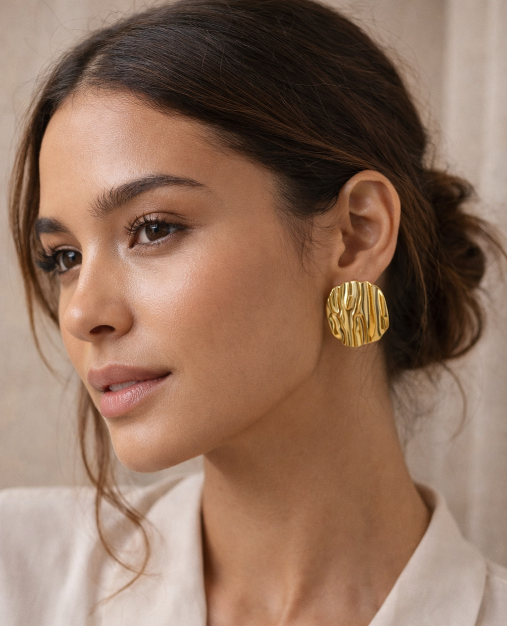 Pendientes acero dorados textura ondulada