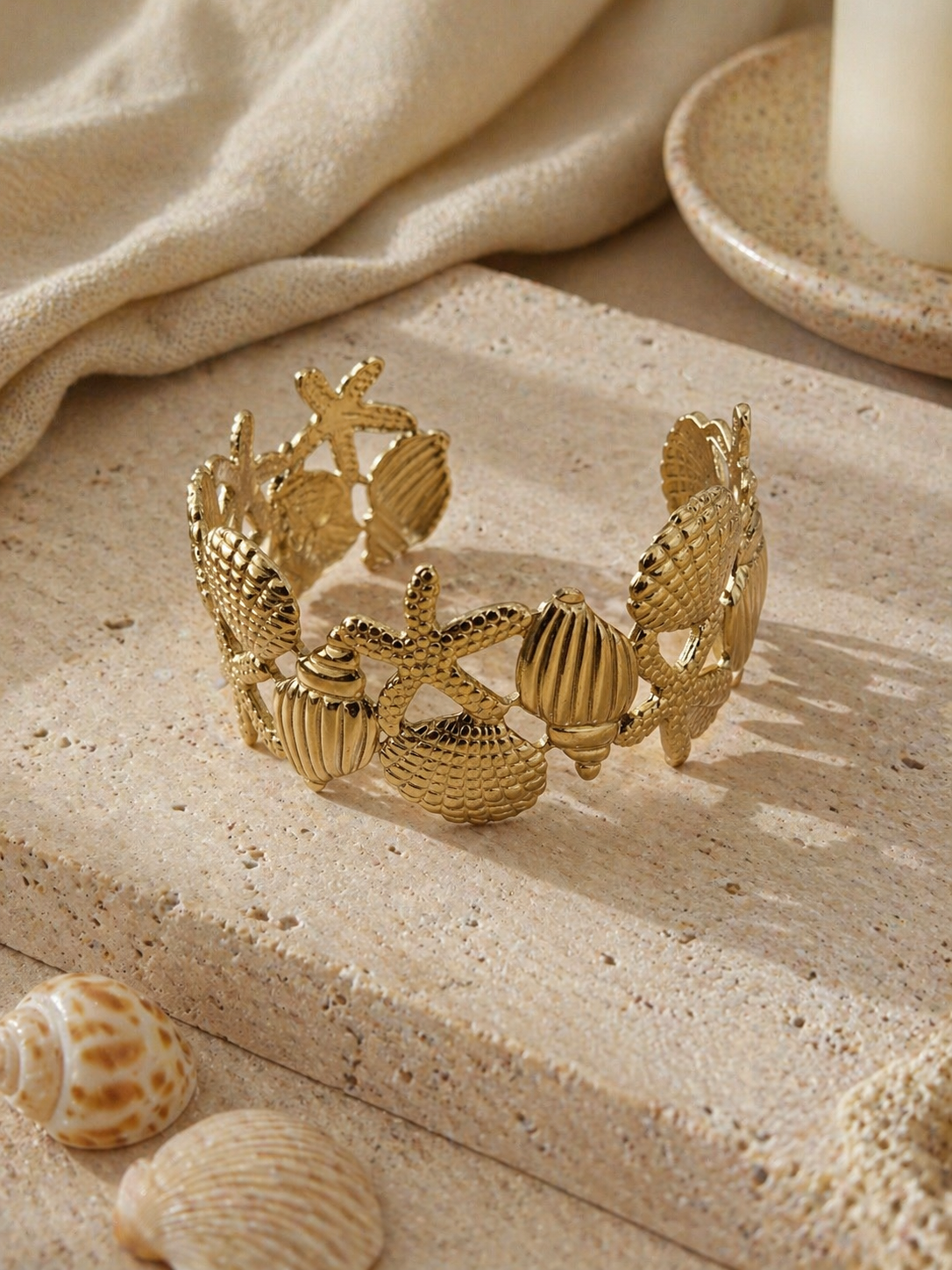 Pulsera Acero dorada con motivos marinos