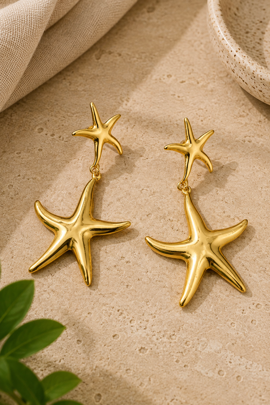 PENDIENTES DOBLE ESTRELLA DORADO