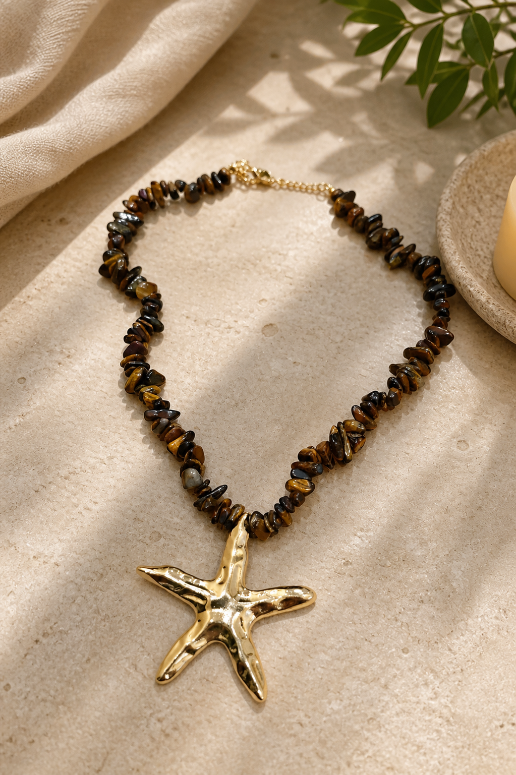 Collar marron acero con estrella de mar
