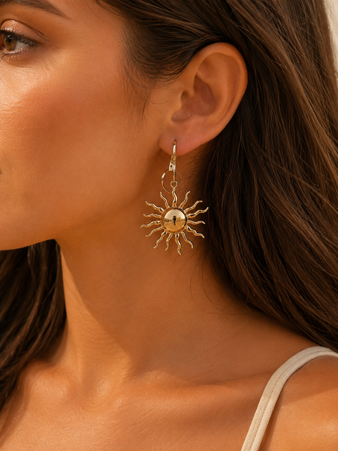 Pendientes dorados con sol
